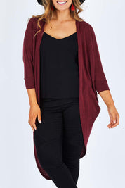 Model Palatina wearing size 14 of the Falling For You Cardi in colour Port (Purple), from the front, cropped image