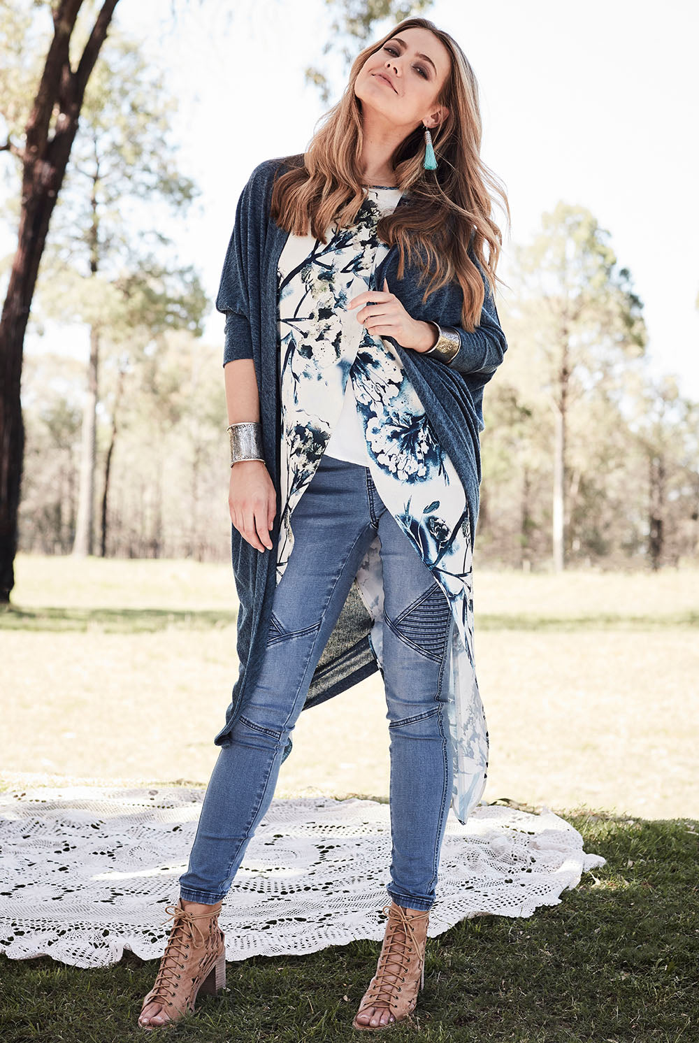 Model Marnee wearing size 10 of the Falling For You Cardi in colour Teal (Blue), from the front, showing the whole outfit