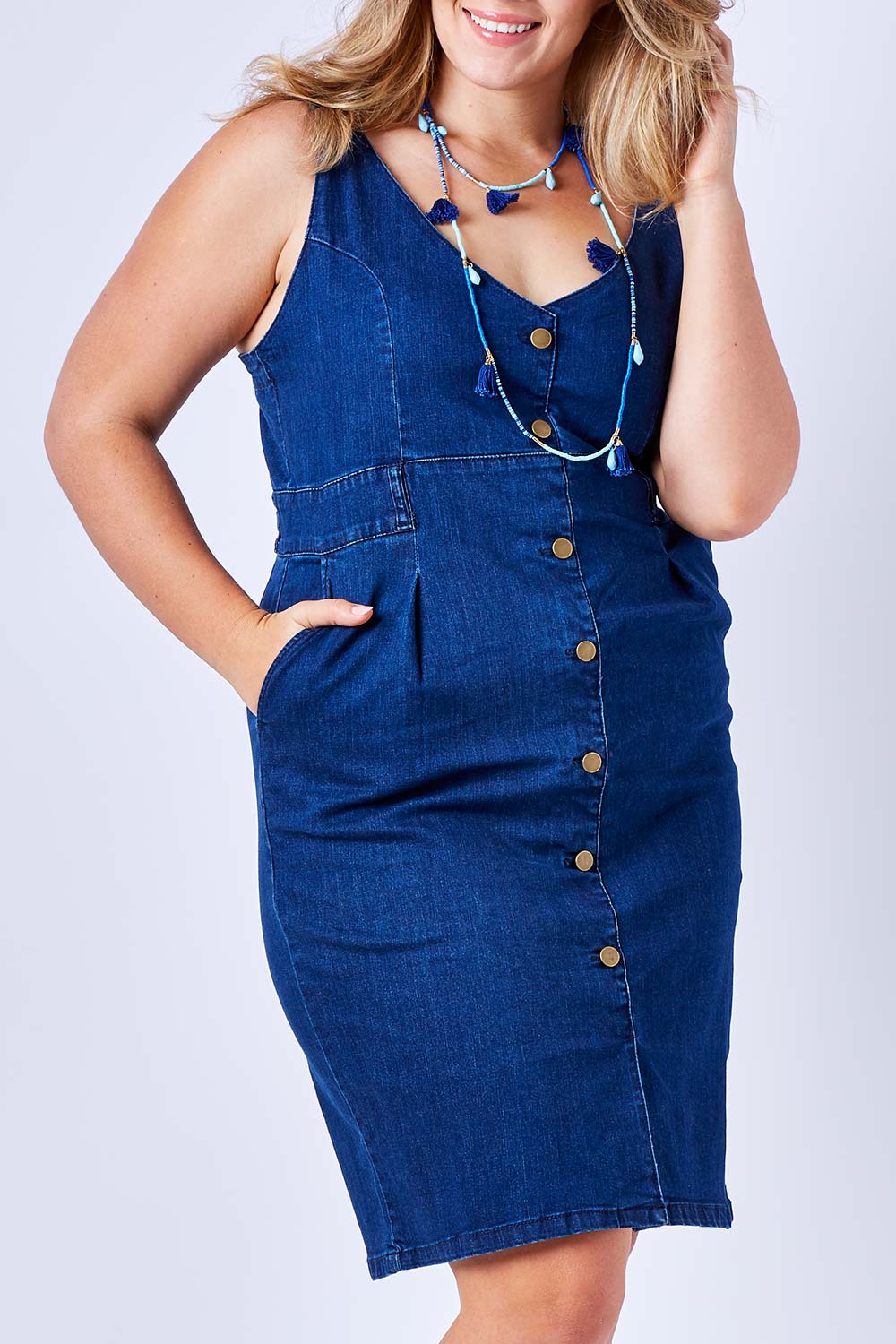 Model Kate wearing size 16 of the Dance With Me Denim Dress in colour Denim (Blue), from the front, cropped image