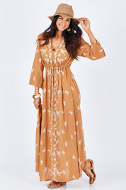 Model Gemma wearing size 10 of the Dancing With Birds Dress in colour Golden, from the front, showing the whole outfit