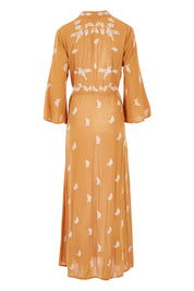 Product shot of the Dancing With Birds Dress in colour Golden, from the back
