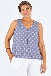 Model Palatina wearing size 14 of the Sugar Snaps Layer Tank in colour Dustyblue (Blue), from the front, cropped image