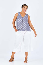 Model Palatina wearing size 14 of the Sugar Snaps Layer Tank in colour Dustyblue (Blue), from the front, showing the whole outfit