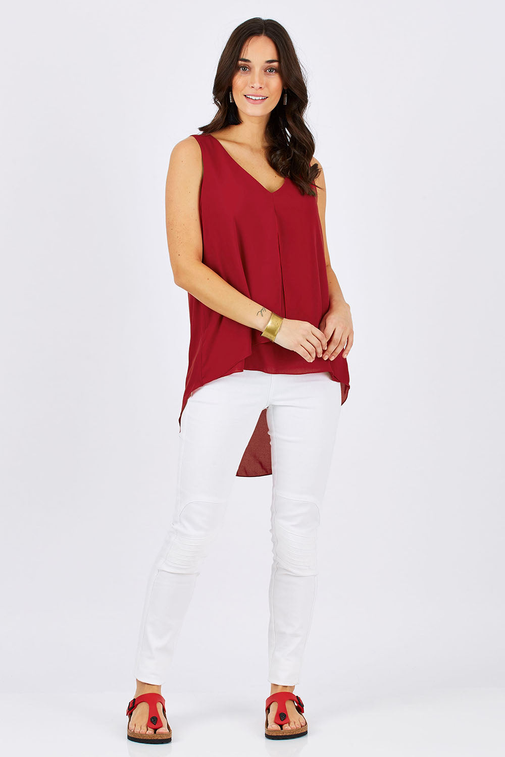 Model Georgia wearing size 10 of the Sugar Snaps Layers Tank in colour Red (Red), from the front, showing the whole outfit