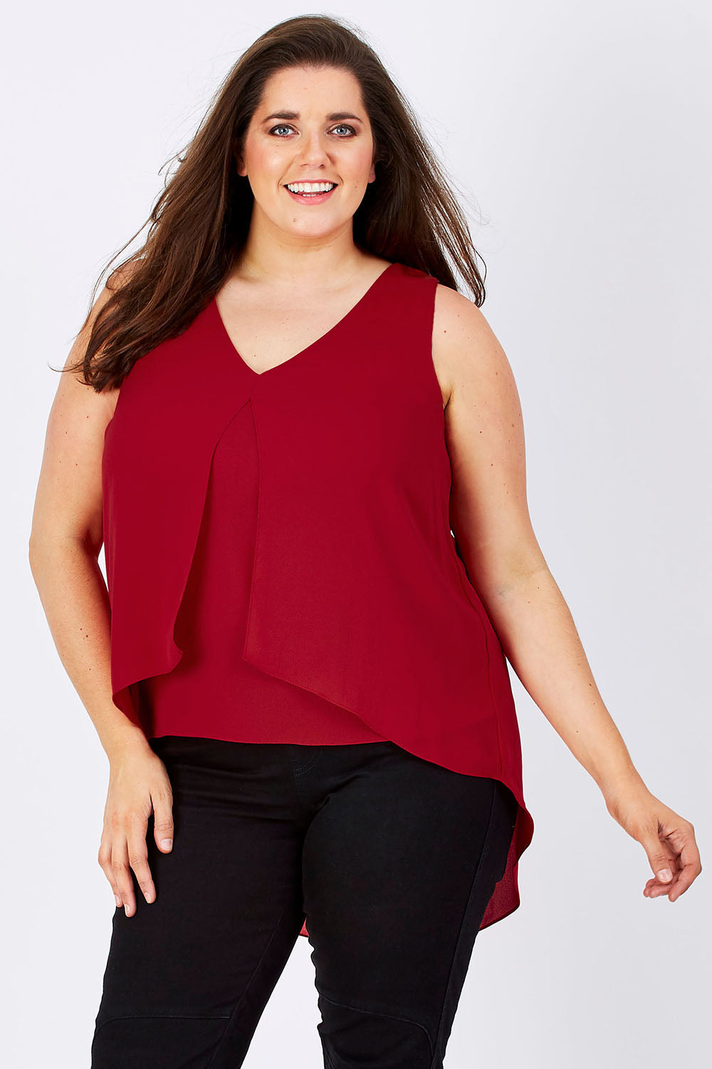 Model Mae wearing size 16 of the Sugar Snaps Layers Tank in colour Red (Red), from the front, cropped image