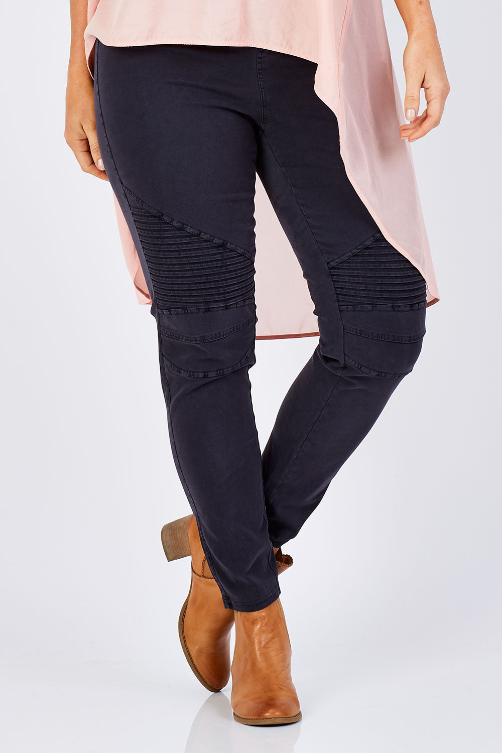 Model Laura wearing size 12 of the Wild Tribe Stitched Jeggings in colour Indigo (Blue), from the front, cropped image
