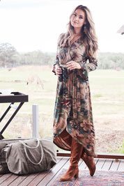 Model Marnee wearing size 10 of the Cloud Dancer Dress in colour Rust, from the front, showing the whole outfit