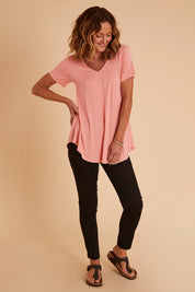 Model Emma wearing size 10 of the Wild Plains Stitched Jeggings in colour Black (Black), from the front, showing the whole outfit