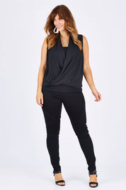 Model Laura wearing size 12 of the Wild Plains Stitched Jeggings in colour Black (Black), from the front, showing the whole outfit