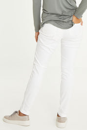 Model Cara wearing size 10 of the Wild Plains Stitched Jeggings in colour White (White), from the back
