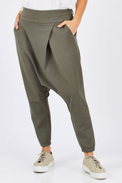 Model Georgia wearing size 10 of the Relax With Me Pants in colour Moss (Green), from the front, cropped image