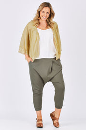 Model Jess wearing size 14 of the Relax With Me Pants in colour Moss (Green), from the front, showing the whole outfit