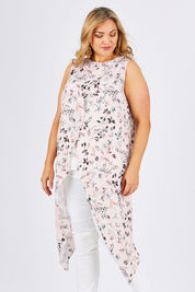Model Ljubenka wearing size 18 of the Flying Free Top in colour PinkFleur (Pink), from the front, cropped image