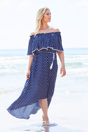 Model Phoebe wearing size 10 of the Florence Maxi Dress in colour NavySpot (Blue), from the front, showing the whole outfit