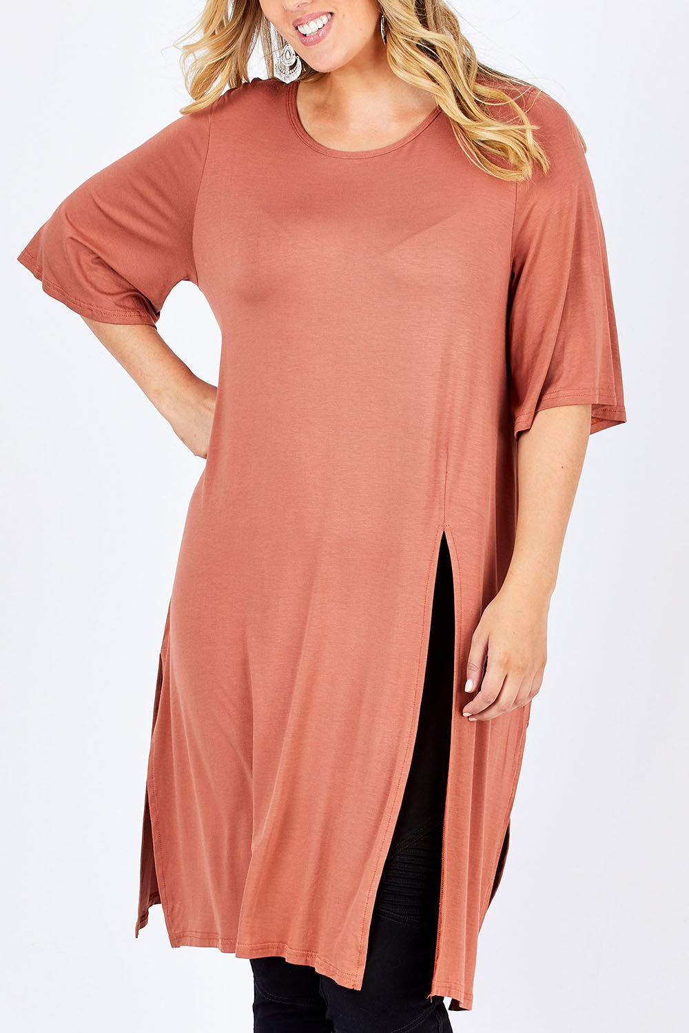 Model Jess wearing size 14 of the Softly Falling Bamboo Tunic in colour Copper, from the front, cropped image