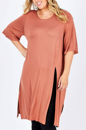 Model Jess wearing size 14 of the Softly Falling Bamboo Tunic in colour Copper, from the front, cropped image