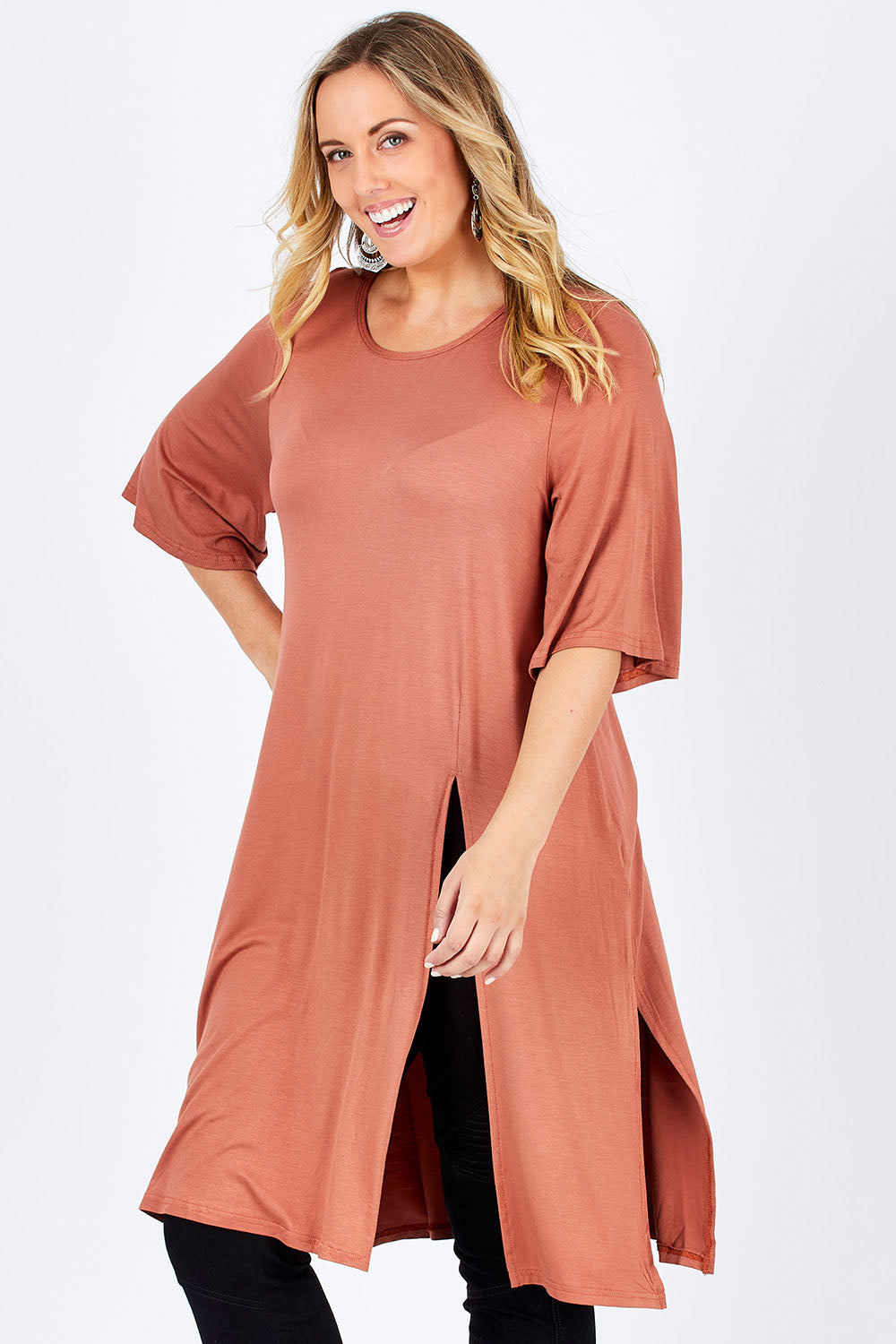 Model Jess wearing size 14 of the Softly Falling Bamboo Tunic in colour Copper, from the front, cropped image
