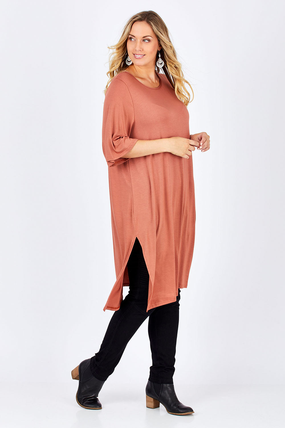 Model Jess wearing size 14 of the Softly Falling Bamboo Tunic in colour Copper, from the front, showing the whole outfit