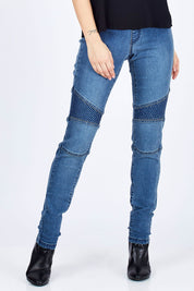 Model Georgia wearing size 10 of the Wild One Stitched Jeggings in colour Denim (Blue), from the front, cropped image