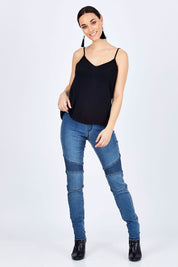 Model Georgia wearing size 10 of the Wild One Stitched Jeggings in colour Denim (Blue), from the front, showing the whole outfit