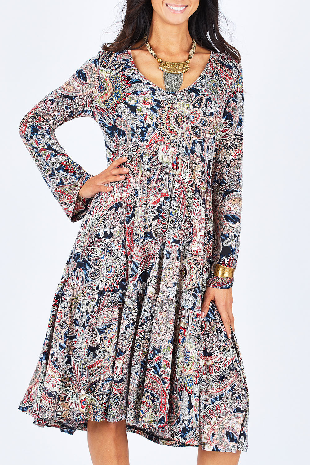 Model Gemma wearing size 10 of the Wind In My Hair Dress in colour Paisley (Red), from the front, cropped image