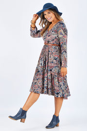 Model Palatina wearing size 14 of the Wind In My Hair Dress in colour Paisley (Red), from the front, showing the whole outfit