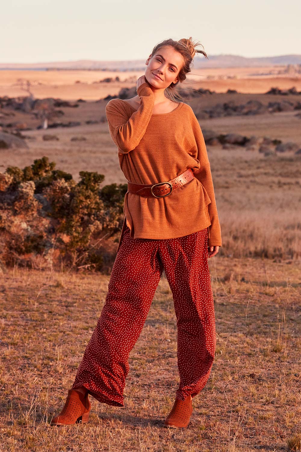 Model Marnee wearing size 10 of the Spotty About You Wide Leg Pants in colour Rust, from the front, showing the whole outfit