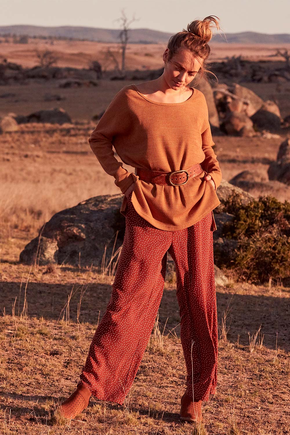 Model Marnee wearing size 10 of the Spotty About You Wide Leg Pants in colour Rust, from the front, showing the whole outfit