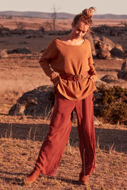 Model Marnee wearing size 10 of the Spotty About You Wide Leg Pants in colour Rust, from the front, showing the whole outfit