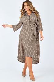 Model Fiona wearing size 16 of the Going With The Flow Dress in colour Taupe, from the front, showing the whole outfit