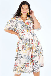 Model Lauren wearing size 18 of the Floating Through The Day Dress in colour Blush (Pink), from the front, cropped image