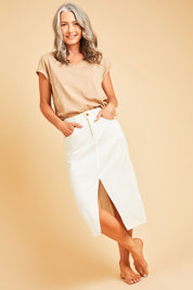 Model Luisa wearing size 10 of the Happy Me Denim Skirt in colour White (White), from the front, showing the whole outfit