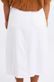 Model Monique wearing size 14 of the Happy Me Denim Skirt in colour White (White), from the back
