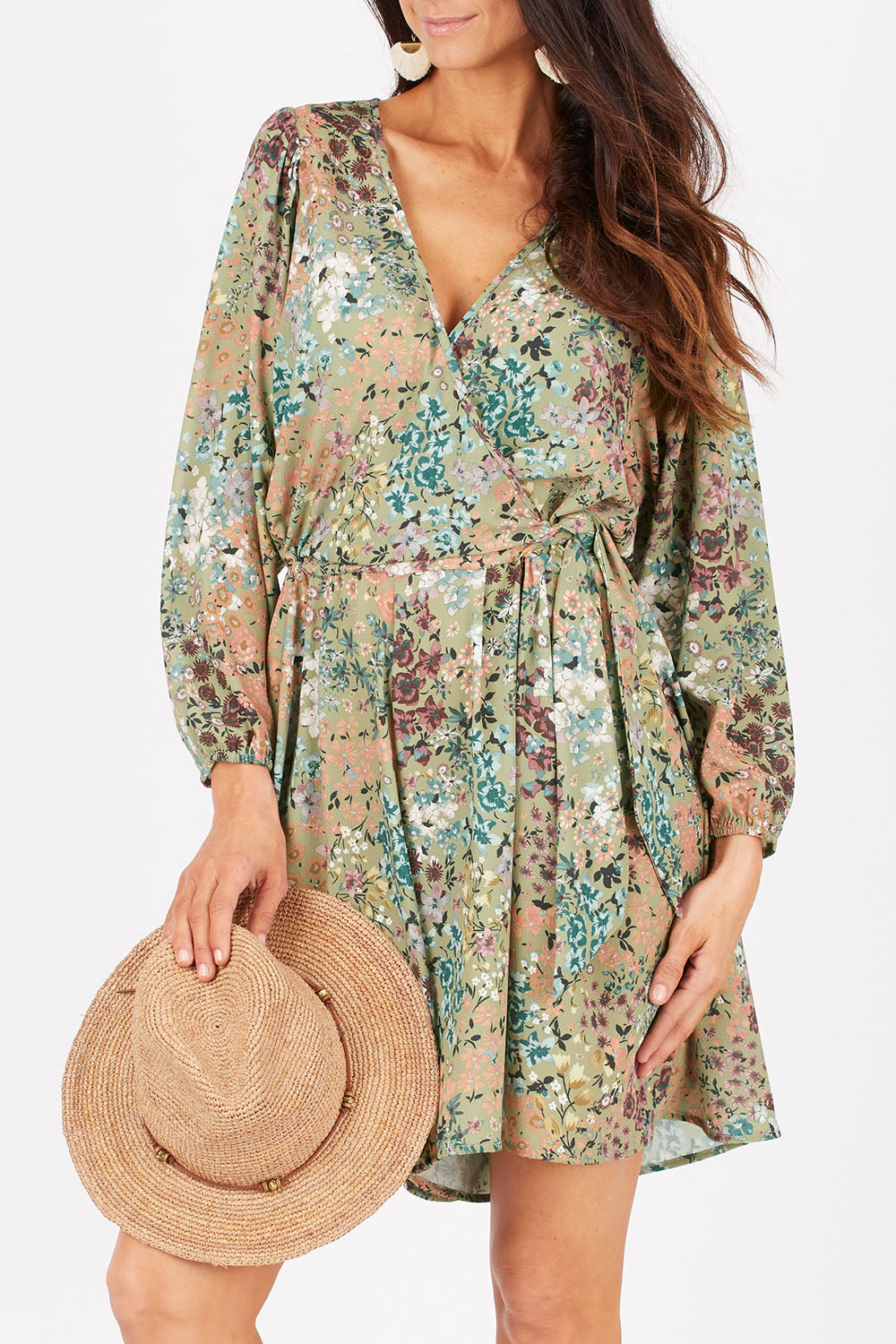 Model Gemma wearing size 10 of the Flower Safari Jumpsuit in colour Khaki (Green), from the front, cropped image
