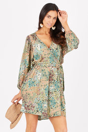 Model Gemma wearing size 10 of the Flower Safari Jumpsuit in colour Khaki (Green), from the front, cropped image