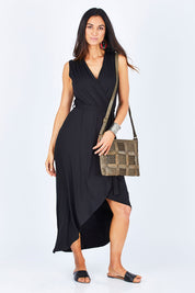 Model Gemma wearing size 10 of the Bamboo Freedom Faux Wrap Dress in colour Black (Black), from the front, showing the whole outfit