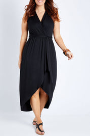 Model Laura wearing size 14 of the Bamboo Freedom Faux Wrap Dress in colour Black (Black), from the front, cropped image