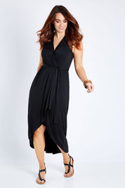 Model Laura wearing size 14 of the Bamboo Freedom Faux Wrap Dress in colour Black (Black), from the front, showing the whole outfit