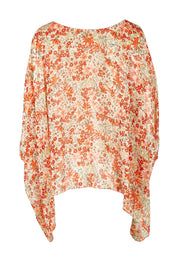Product shot of the Easy Peasy Throw Top in colour Orangepop, from the back
