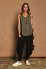 Model Madeline wearing size 10 of The Wanderer In Me Travel Pant in colour Black (Black), from the front, showing the whole outfit