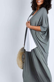 Model Pamela wearing size 10 of the Falling For You Bamboo Cardi in colour Fern (Green), from the front, cropped image