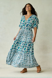 Model Tahnee wearing size 10 of the Tiers Of Joy Maxi Dress in colour Bluefleur (Blue), from the front, showing the whole outfit