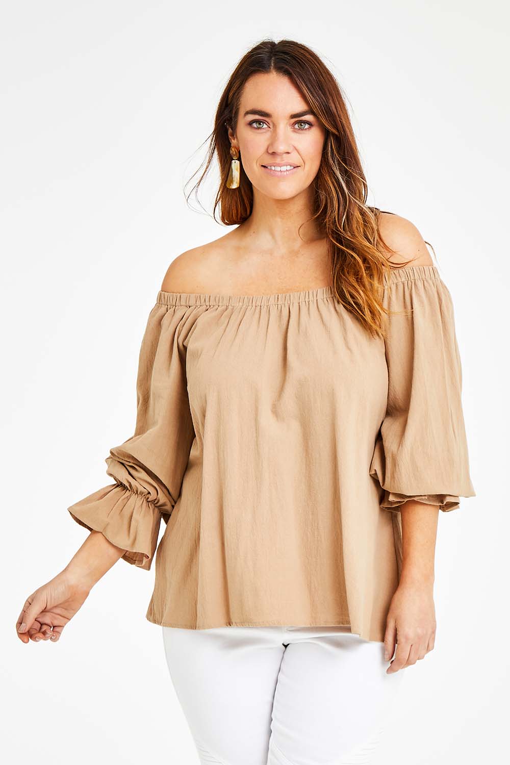 Model Laura wearing size 14 of the Twinkle In My Eye Off The Shoulder Top in colour Sand, from the front, cropped image