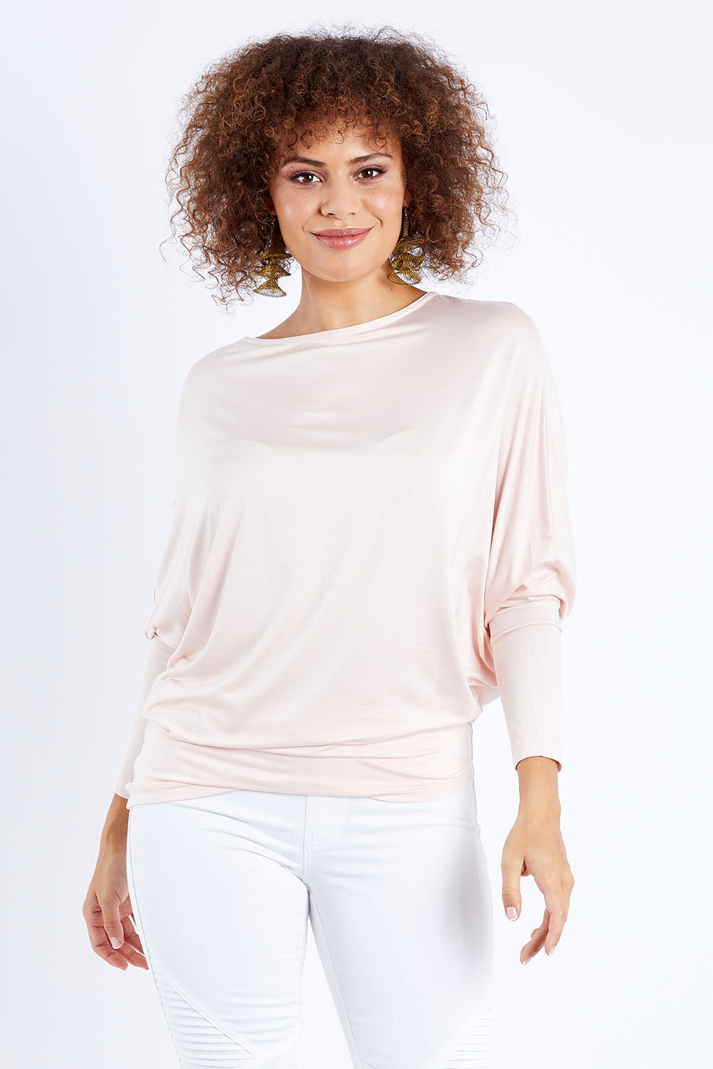 Model Lala wearing size 10 of the Softly Swinging Bamboo Batwing Top in colour Ballet (Pink), from the front, cropped image