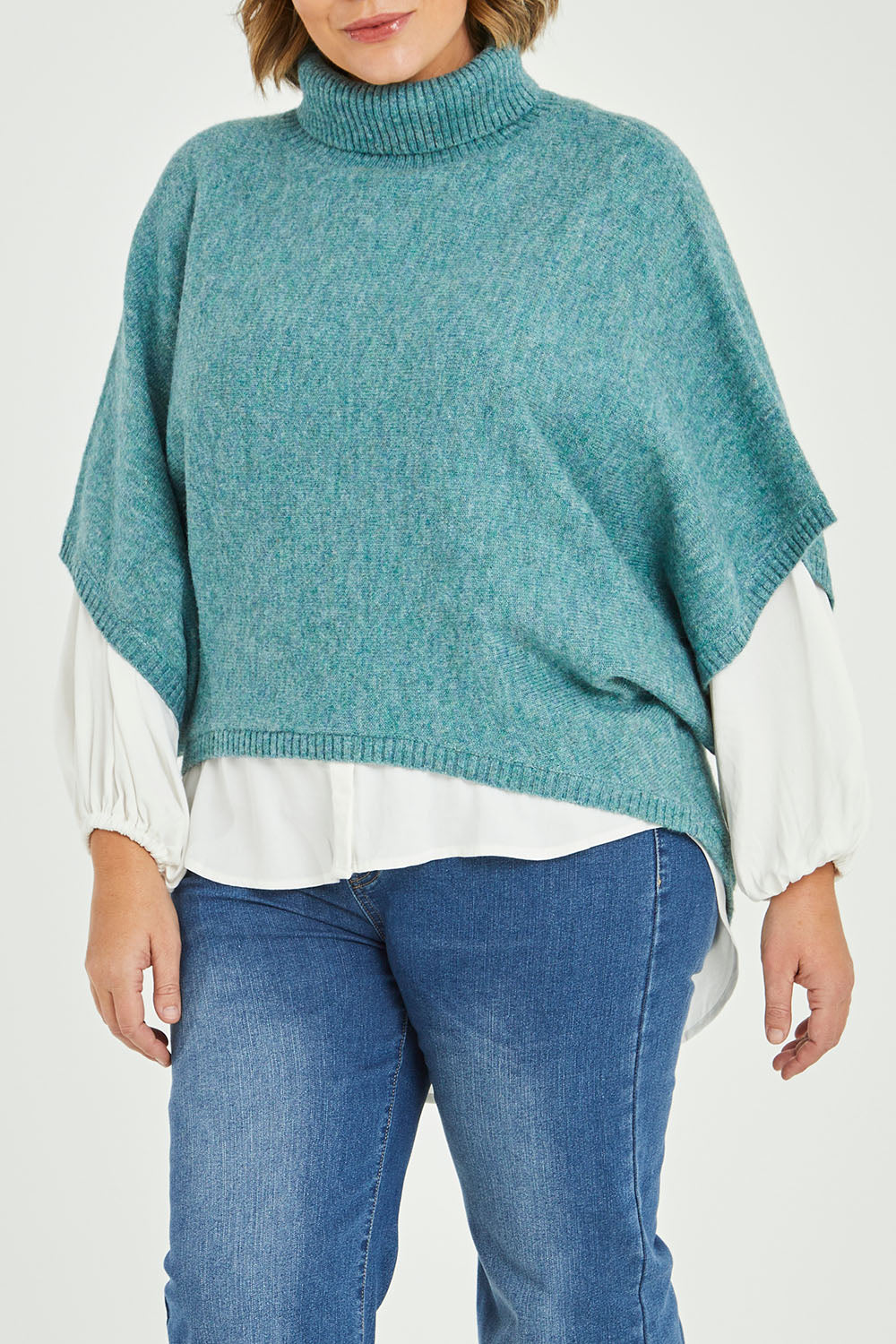 Model Fiona wearing size XL of the Addicted To You Sweater in colour Sea (Blue), from the front, cropped image