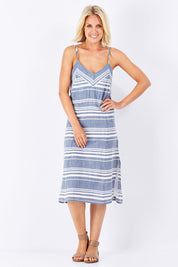Model Jude wearing size 10 of the Orla Dress in colour Mohalo (Blue), from the front, showing the whole outfit