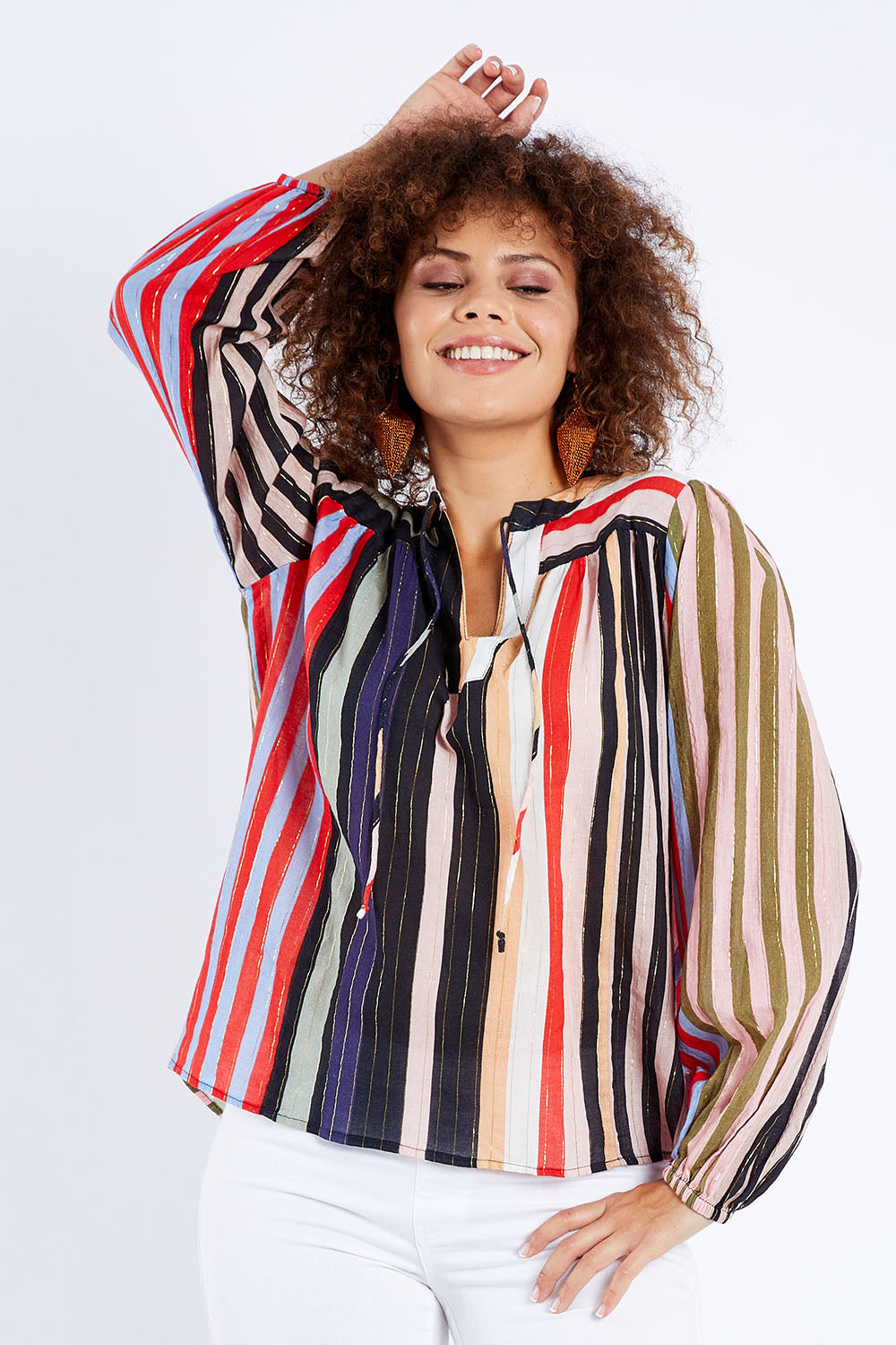 Model Lala wearing size 10 of the Fleetwood Top in colour Manhattan, from the front, cropped image