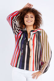 Model Lala wearing size 10 of the Fleetwood Top in colour Manhattan, from the front, cropped image