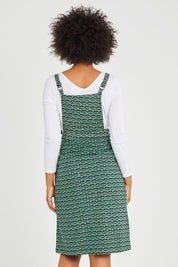 Model Olivia wearing size 10 of the Berty Reversible Tunic in colour Fresconavy (Blue), from the back