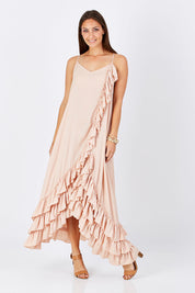 Model Anna wearing size S-M of the Margarita Dress in colour DustyRose (Pink), from the front, showing the whole outfit